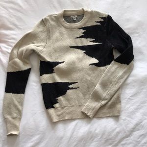 Size XS black and cream sweater.